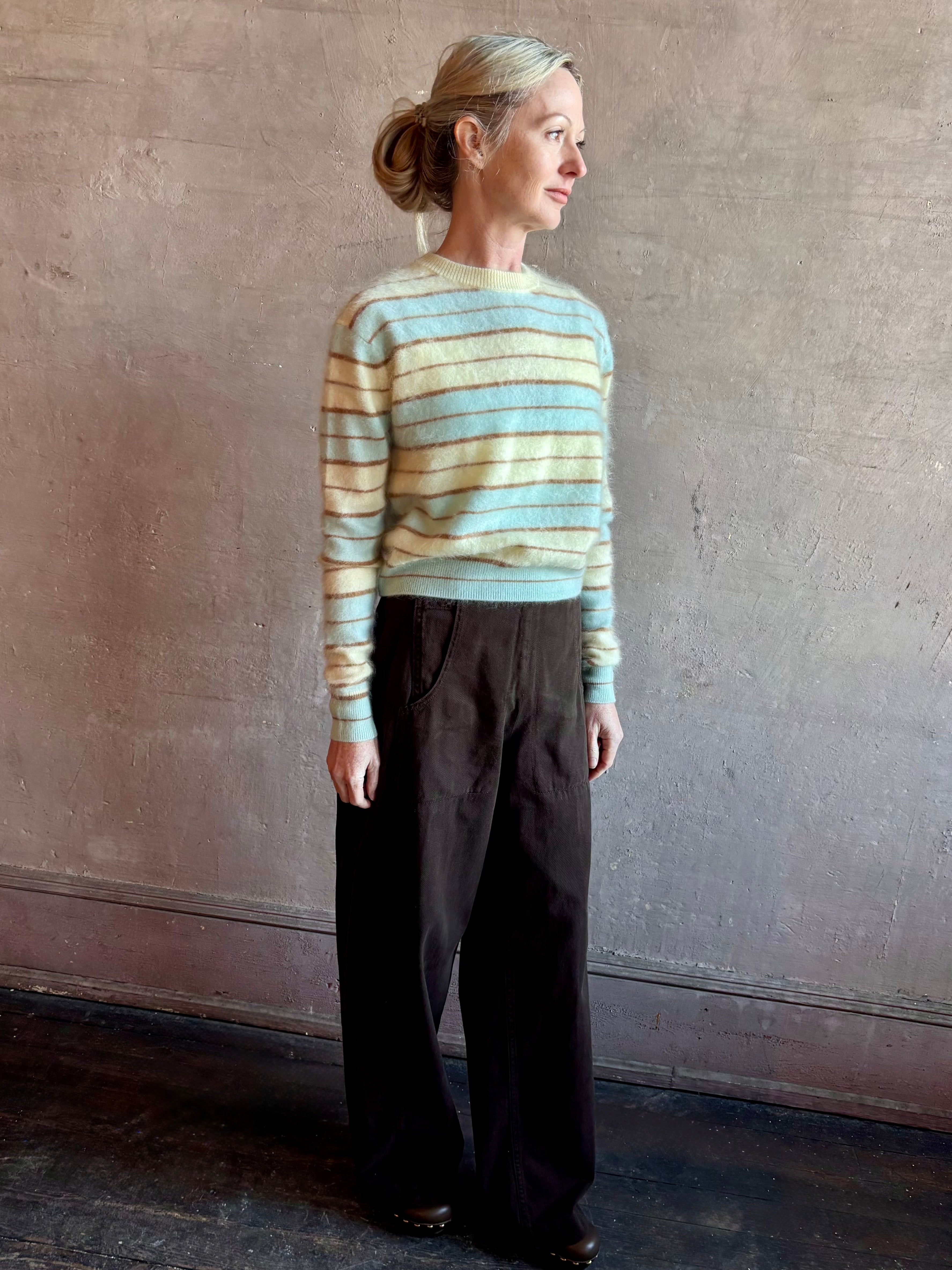 Image of woman wearing premium brushed cashmere crew neck sweater from Guest in Residence in sea glass and yellow stripe 