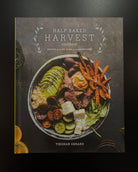 Image of front cover of the book 'Half Baked Harvest Cookbook' by Tieghan Gerard, featuring a colorful bowl of food