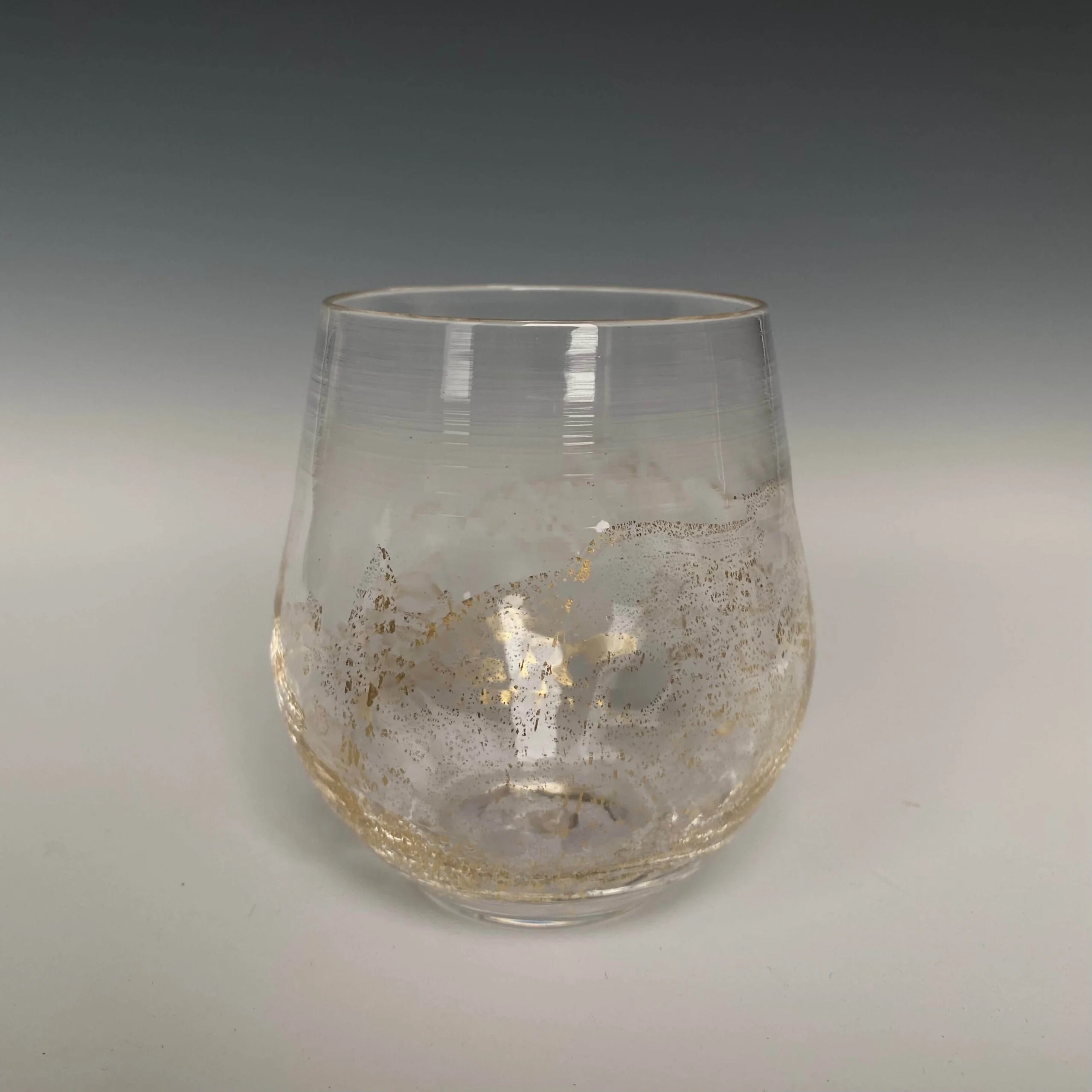 Handblown Stemless clear Wine Glass from North Carolina aritist John Shoemaker with gold leaf and made in USA