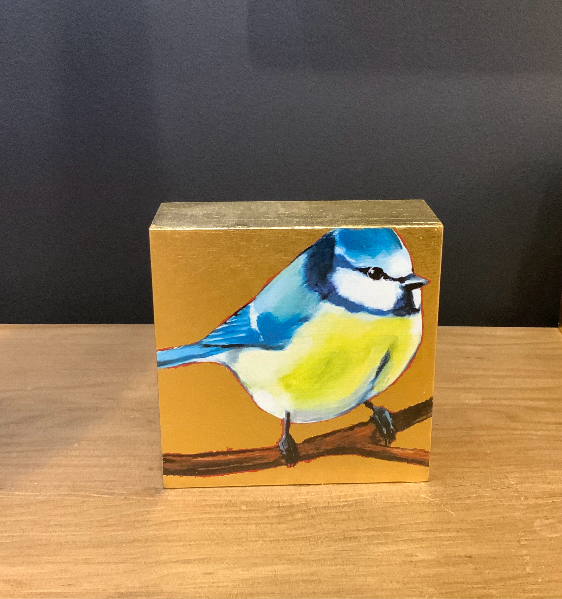 Image featuring South Carolina Fine art painter Joseph Bradley giclee with small Eurasian Blue Tit bird and gold leaf