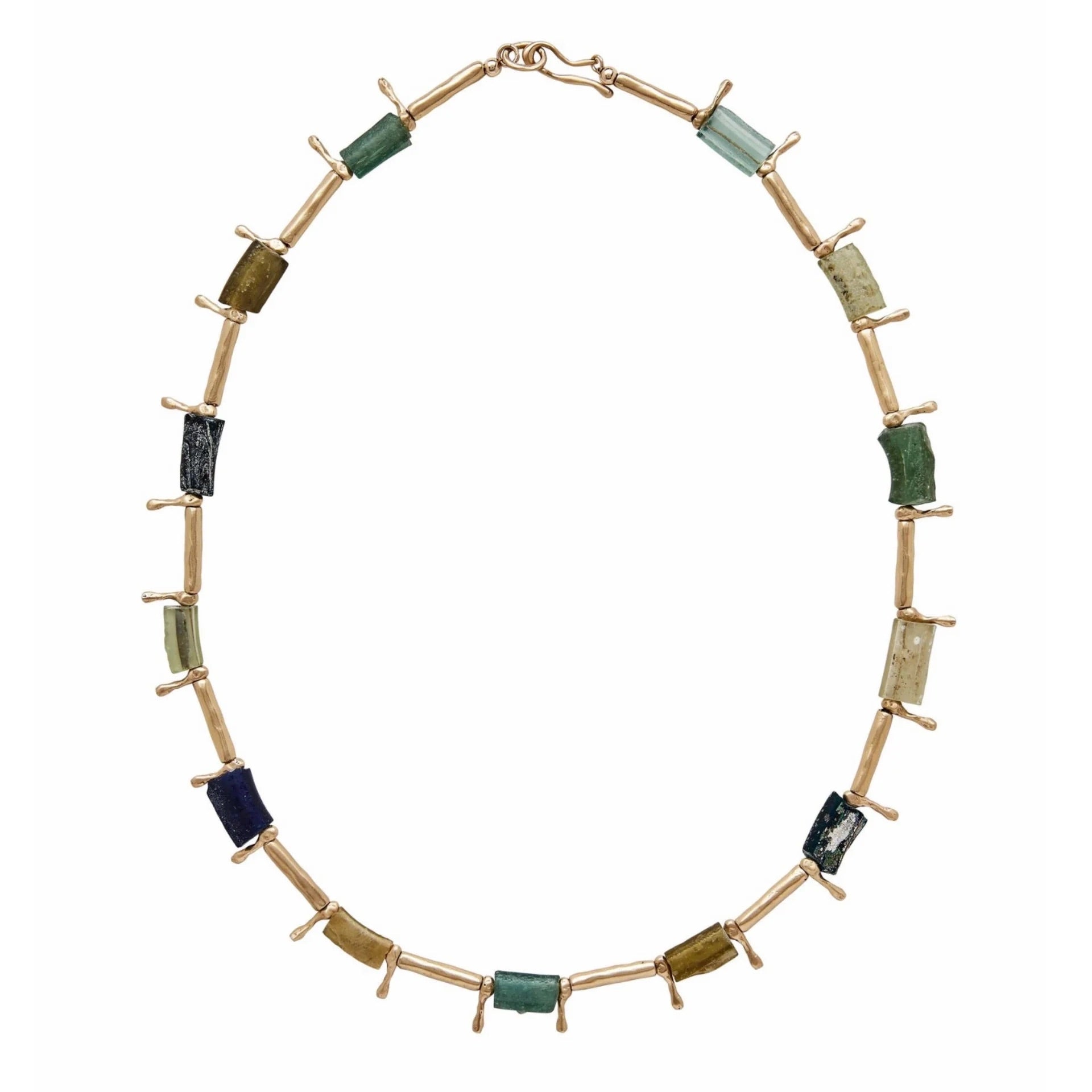 A bronze necklace featuring interspersed Byzantine glass beads in various shades of green, blue, and brown, with sand cast bronze metal accents handmade in USA by Texas jewelry artist Julie Cohn