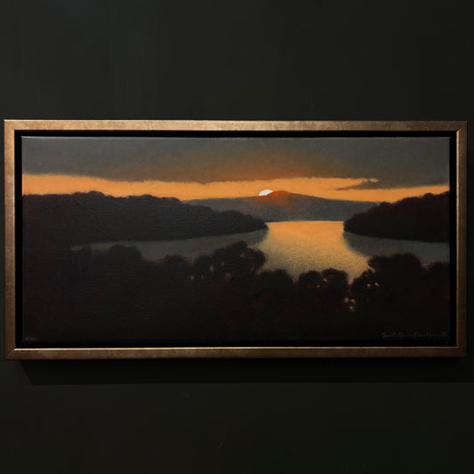 Image featuring a giclee with setting sun on water from local North Carolina artist Janet Green Jacobson.