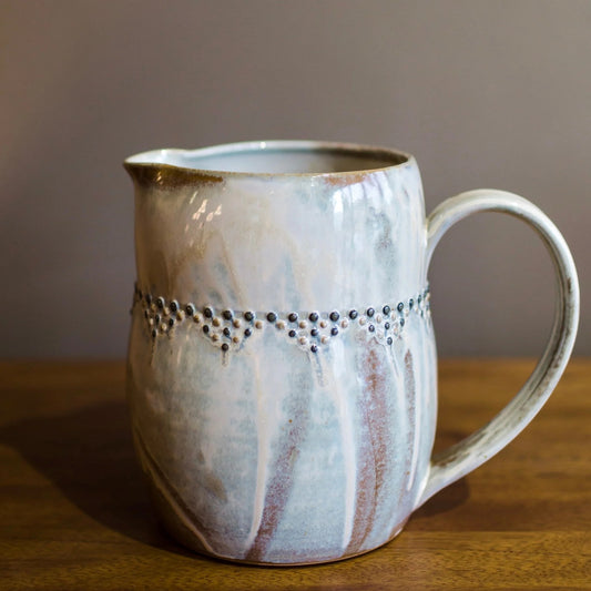 Image featuring North Carolina artist Katie Meili Messersmith functional pottery with a zen-like satisfaction handmade.