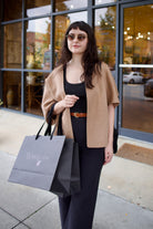 Model wearing beige Kujten luxury french cashmere Asi cape with Ulla Johnson, Veronica Beard & Mansur Gavriel