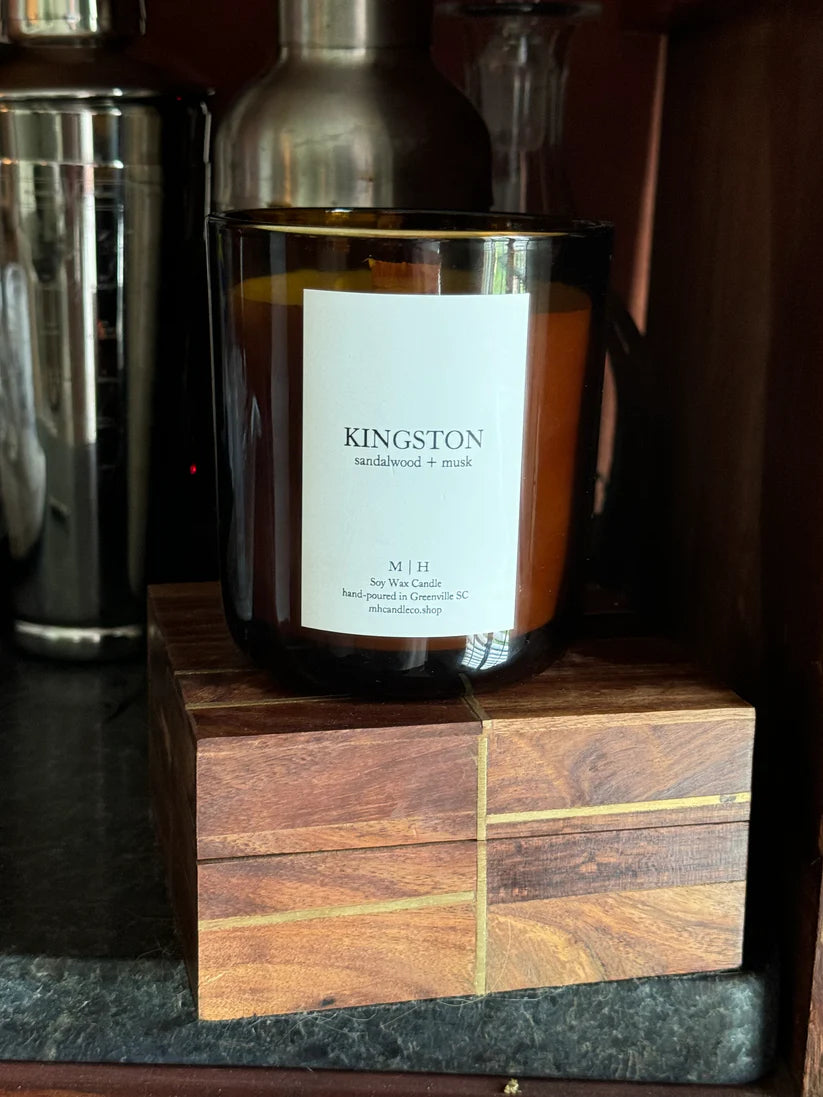 Image of the Southbourne candle  hand poured in Greenville South Carolina in a calming blend of sandalwood and soft musk crafted in a glass container with Soy Wax and a wood wick