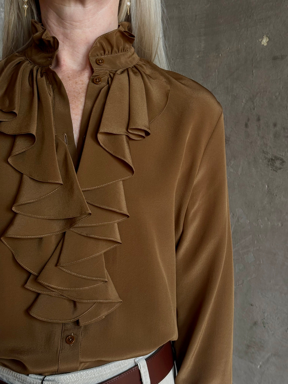 Mature woman wearing Nili Lotan's Lily Long sleeve Blouse Cognac silk delicate front ruffle Warm romantic American-made