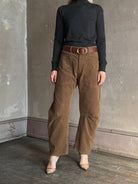 Mature woman wearing Nili Lotan Shon brown barrel-leg corduroy pants front pockets natural fiber made in USA