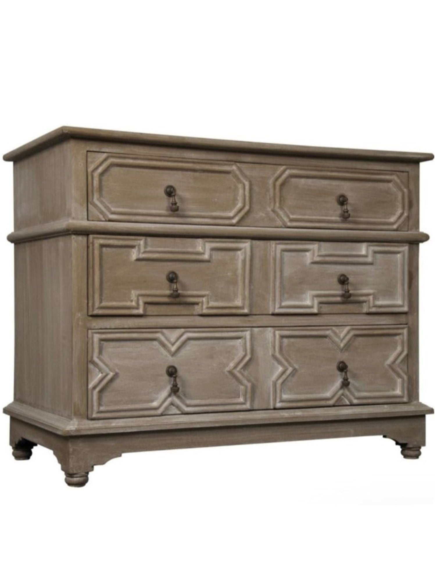 A traditional wooden dresser with three drawers, featuring metal pulls and hand-carved geometric patterns, with a weathered finish.