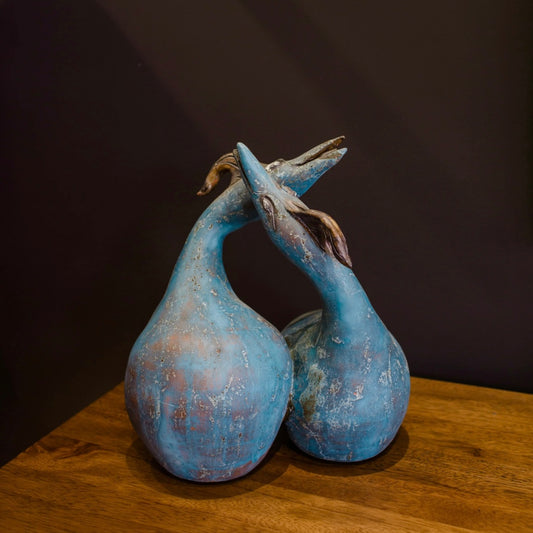 Image featuring North Carolina pottery artist Pam Brewer Doubles Dance with hand built pottery birds