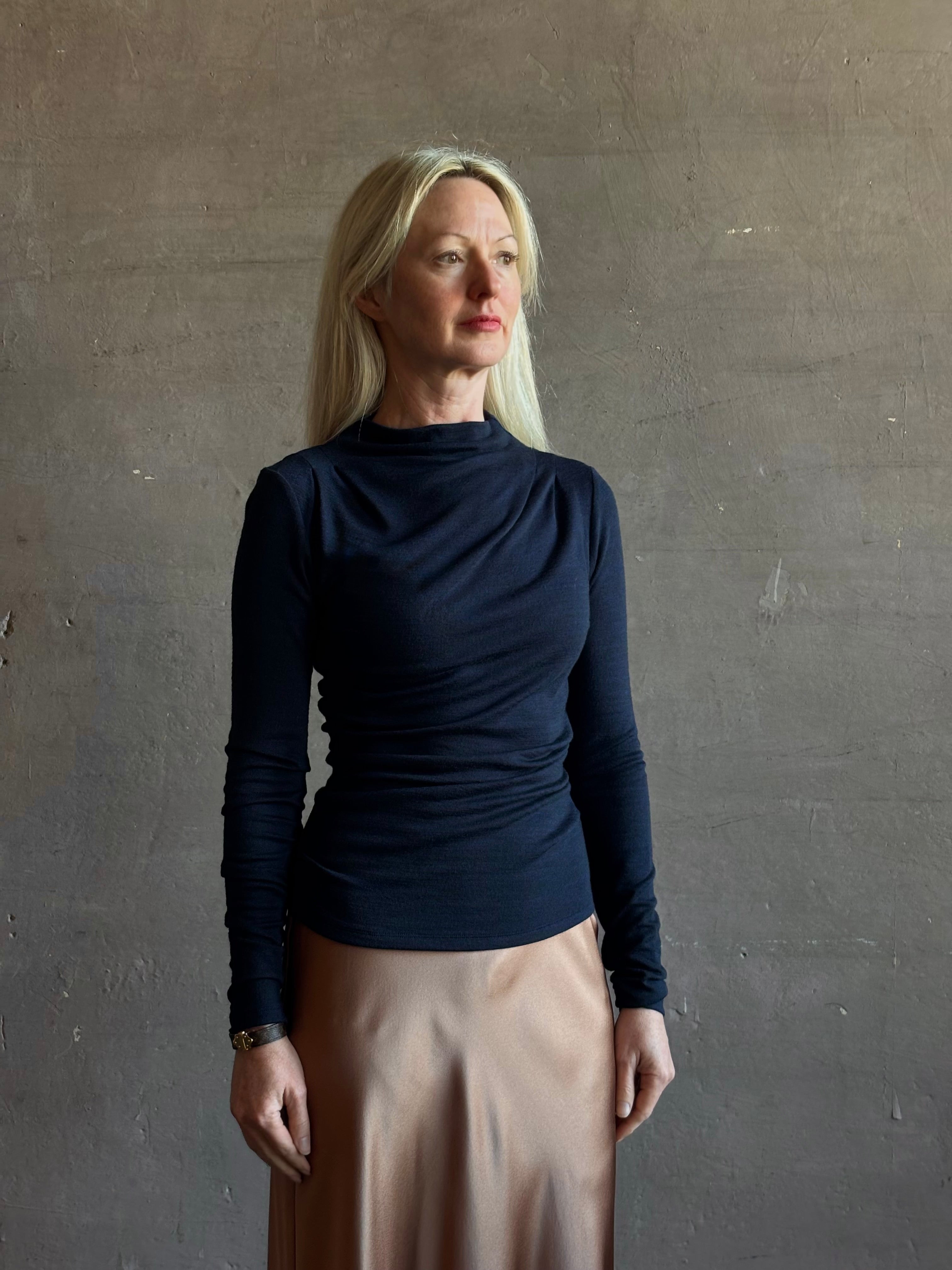 Proenza Schouler Mini Jersey Top with shoulder pleats, ruching down one side, and fluid draping long sleeves mock neck