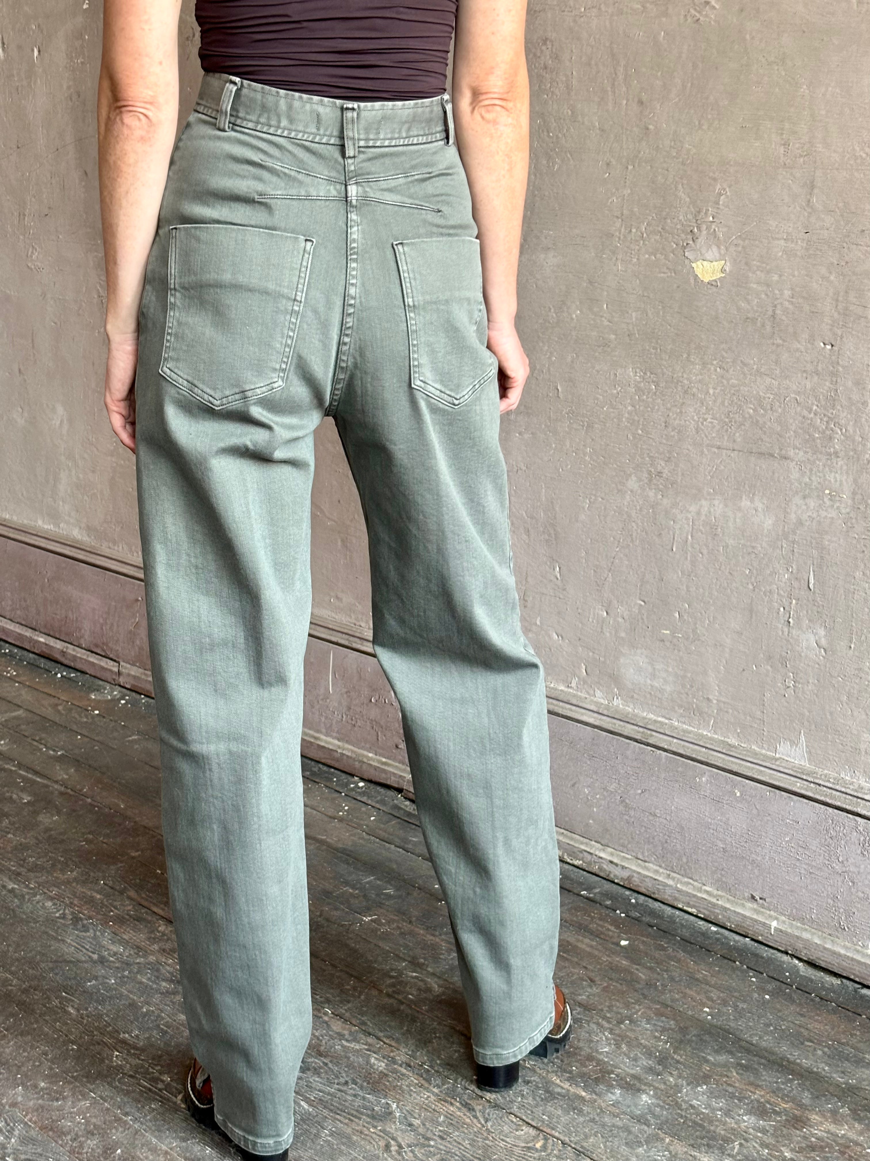 Image of mature woman wearing American designer Rachel Comey Dardo Pant in grey green showcasing expert tailoring with back detail similar to Alaia