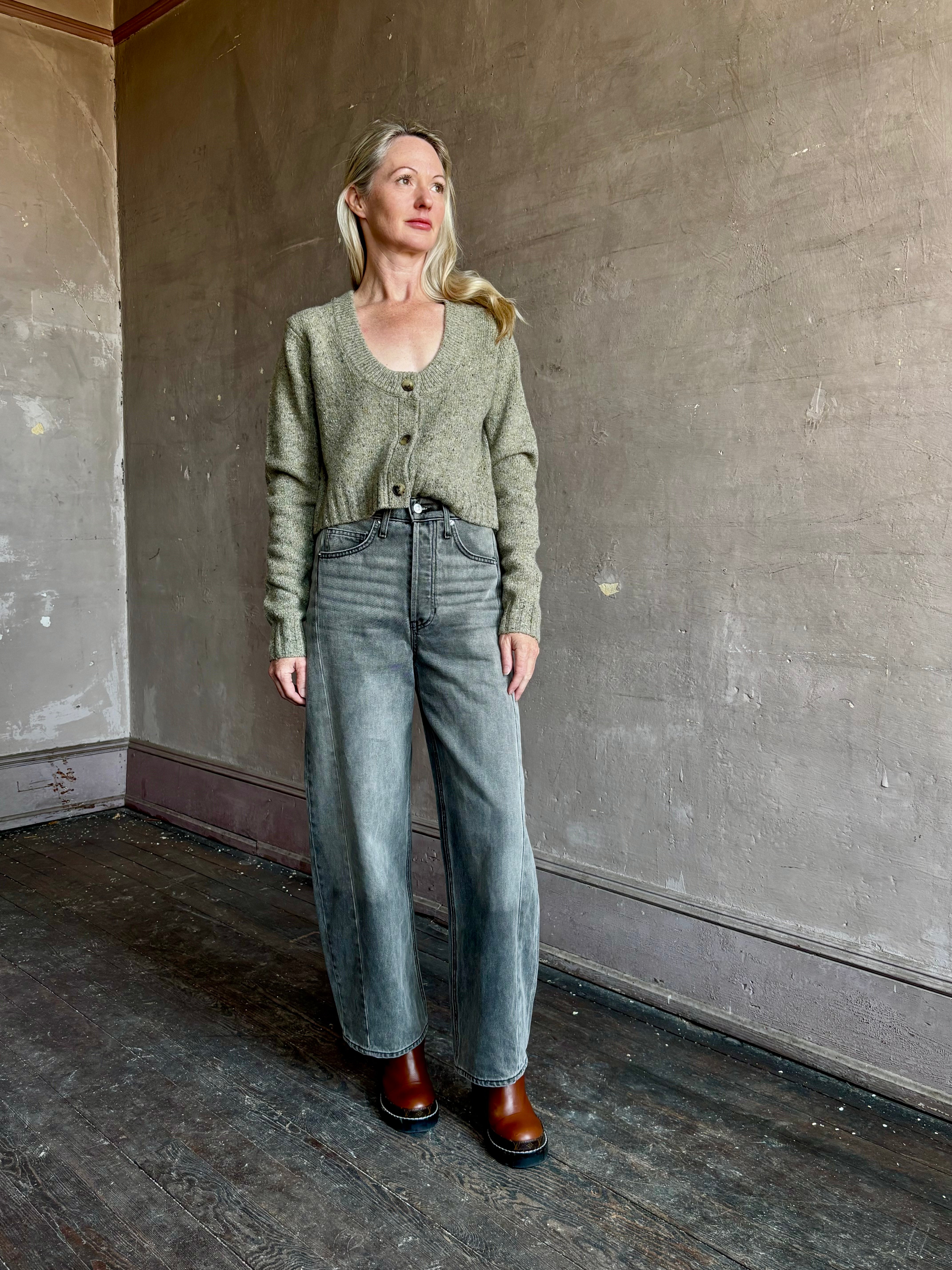 Image of mature woman wearing American designer Rachel Comey Uridge Cardigan in sophisticated green with a flattering U-neckline