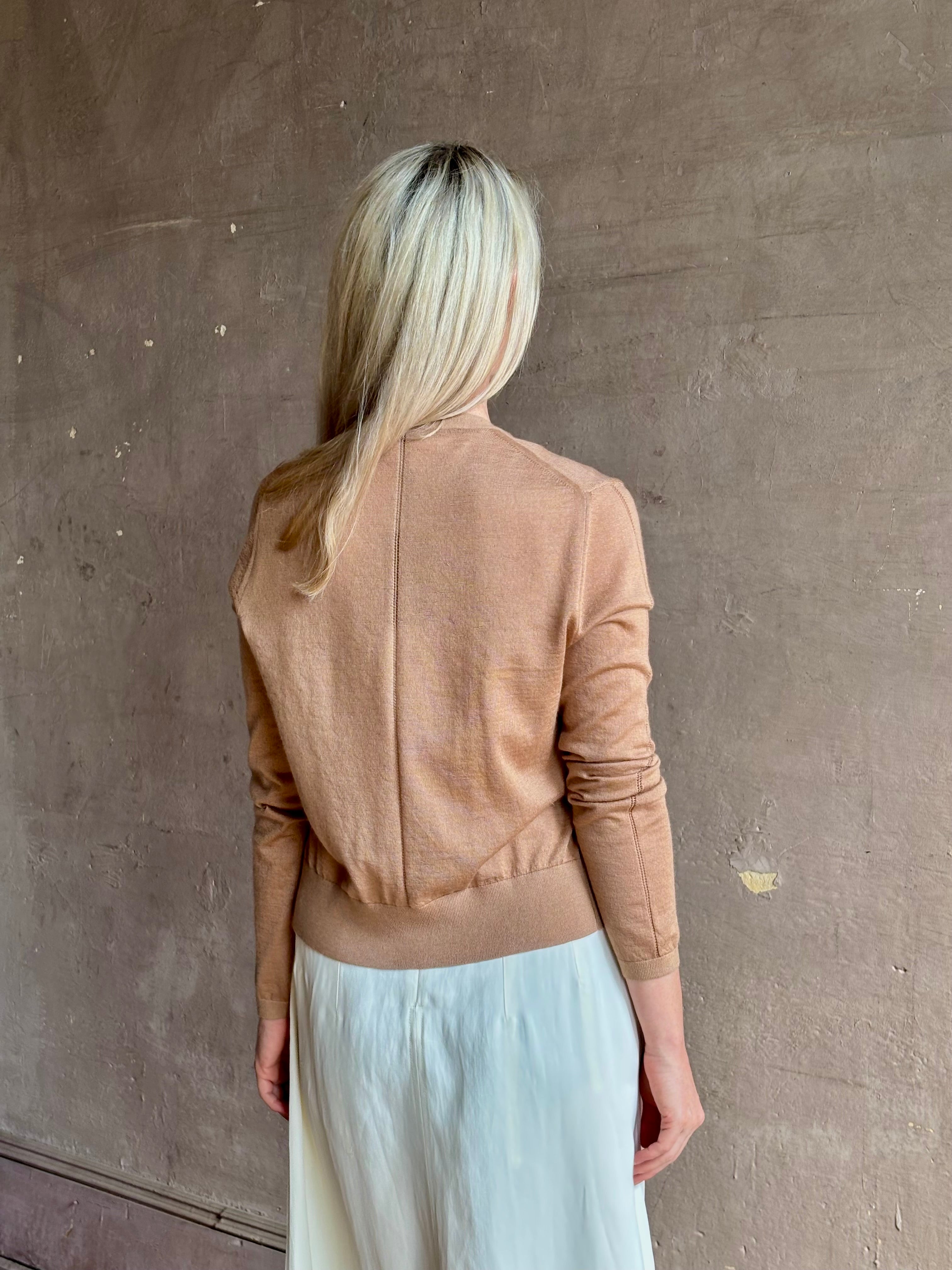 Mature woman wearing Rachel Comey long sleeve caramel cardigan leightweight plunging v-neck layering