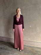 Mature woman wearing Rachel Comey long sleeve burgundy cardigan leightweight plunging v-neck layering