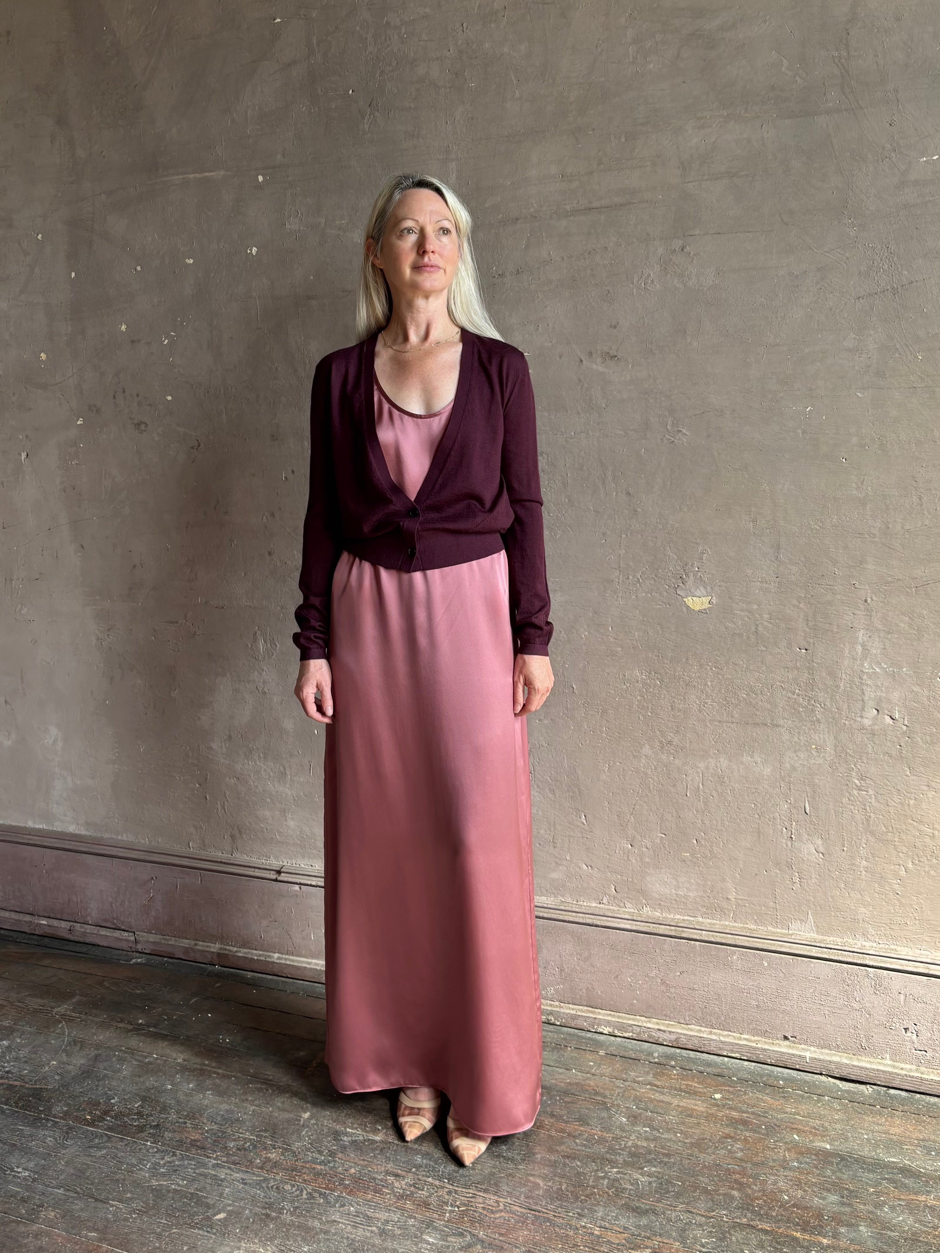 Mature woman wearing Rachel Comey long sleeve burgundy cardigan leightweight plunging v-neck layering