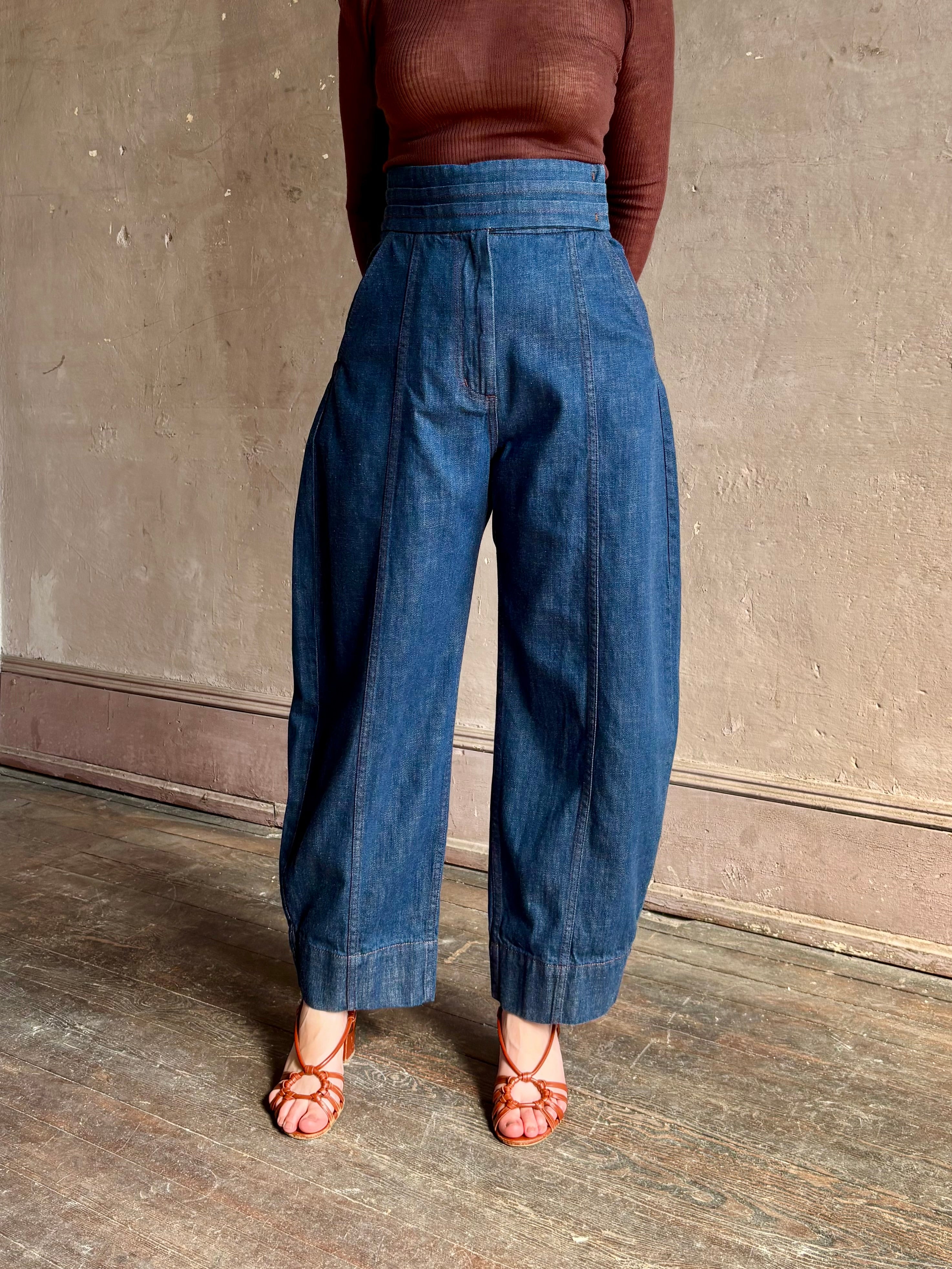 Rachel Comey sculptural high-rise dark wash denim with a built-in cummerbund-style waist barrel leg