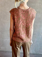 Image of woman wearing New York Designer Rachel Comey pink Brocca sweater with bronze metallic abstract pattern
