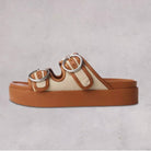 Image featuring the Rag & Bone slide sandals sit a top substantial platforms with ergonomic toes and molded foot beds for comfort. 