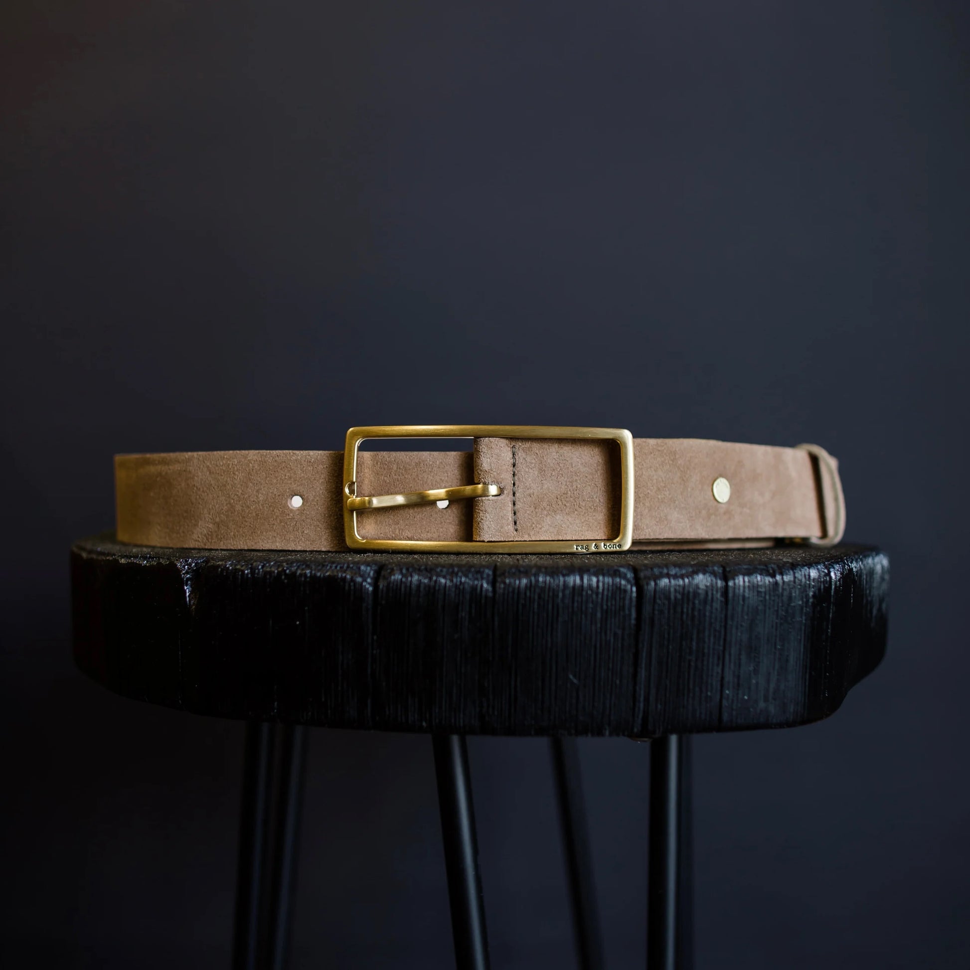 Image featuring the rag & bone  versatile suede hip belt with a wide rectangular brass buckle in taupe.