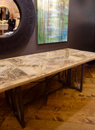Reclaimed barnwood table with metal base intricate cross pattern. Beautiful cusom rustic modern dining room table hand crafted in USA