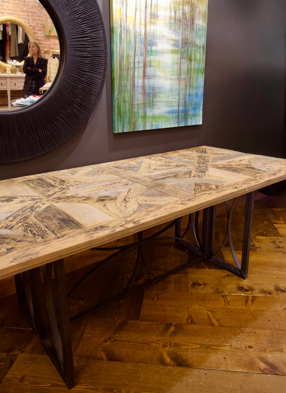 Reclaimed barnwood table with metal base intricate cross pattern. Beautiful cusom rustic modern dining room table hand crafted in USA
