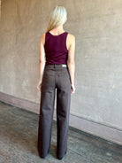 Image of mature woman wearing premium wool SABLYN Addyson V-Neck Layering Tank Top in a rich Bordeaux 