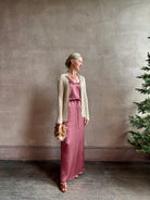 Mature woman wearing Sablyn Claudia B Scoop Neck Silk Tank and skirt set in Desert Bloom flattering scoop neckline Made in the USA effortlessly elevated