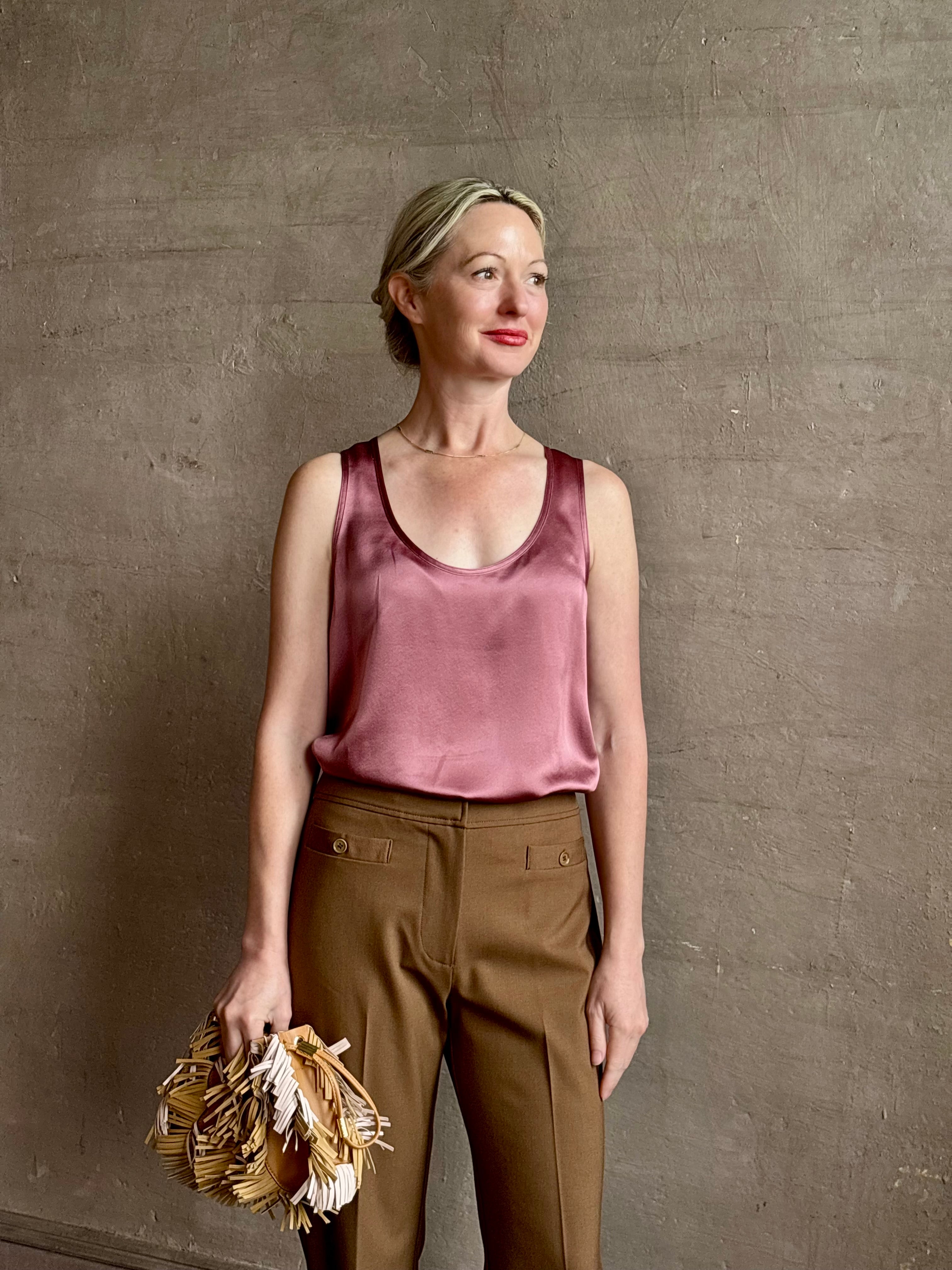 Mature woman wearing Sablyn Claudia B Scoop Neck Silk Tank in Pink Rose flattering scoop neckline Made in the USA effortlessly elevated