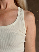 Mature woman wearing Sablyn Coco Scoop Neck cream Tank Top ribbed soft knit comfortable layering basic 