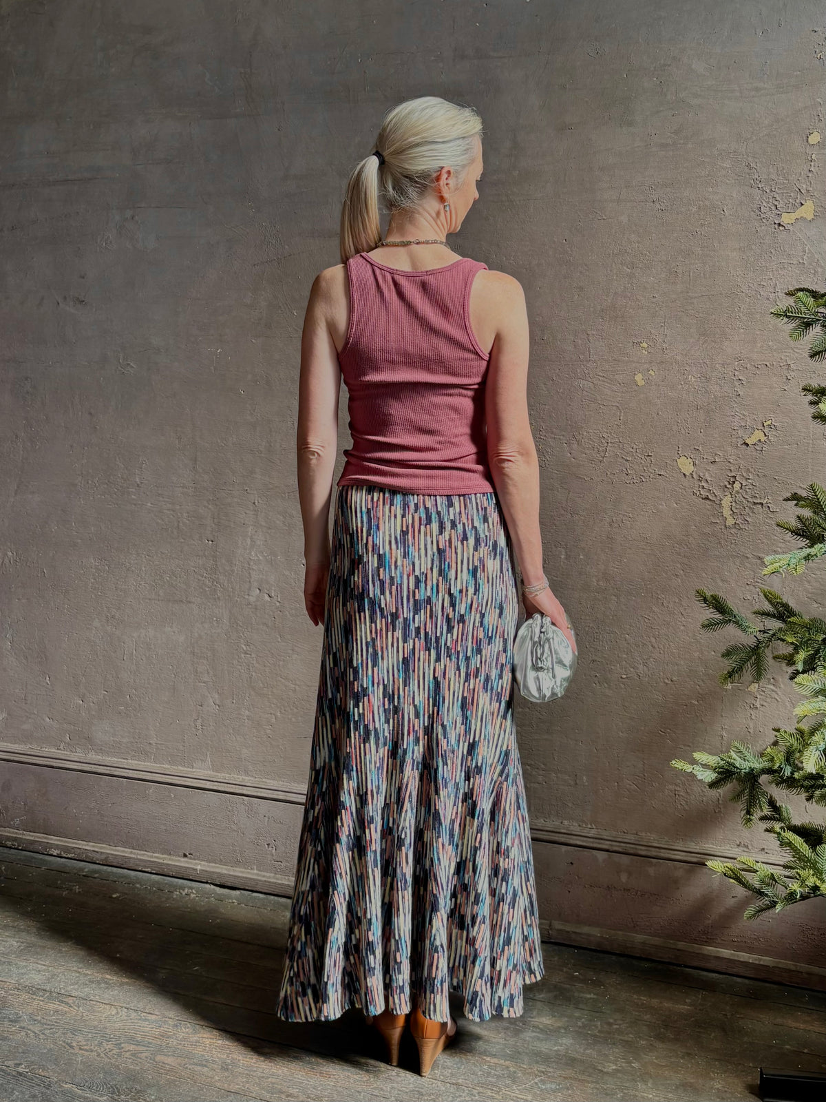 Mature woman wearing Sablyn Coco Scoop Neck Tank in Rose tailored scoop neckline Soft dusty rose layering essential