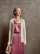 Mature woman wearing Sablyn Sol Maxi Skirt in Desert Bloom silk charmeuse relaxed drawstring waist Fluid