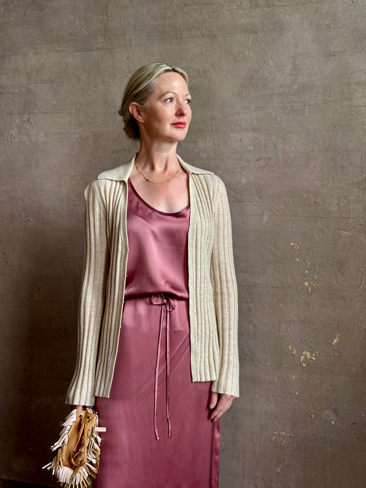 Mature woman wearing Sablyn Sol Maxi Skirt in Desert Bloom silk charmeuse relaxed drawstring waist Fluid
