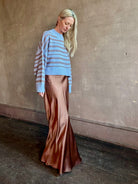 Mature woman wearing luxury brand SABLYN Wells B Cropped Pullover Sweater in Azureous Multi