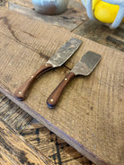 A small and large rustic modern charcuterie serving knife set with hand-forged steel blade and a walnut wooden handle hand crafted in USA