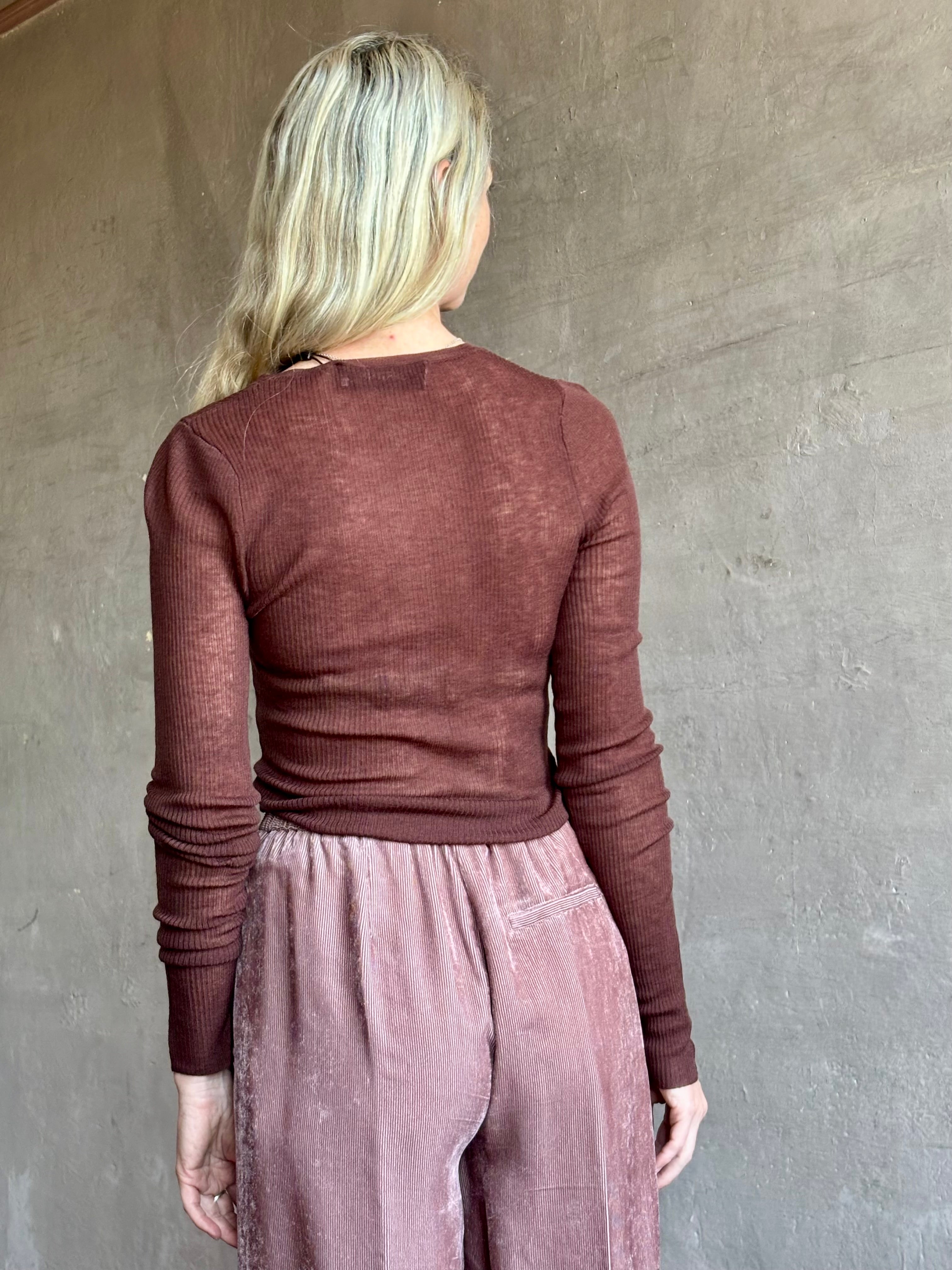 Image of mature woman wearing semi-transparent lightweight long sleeve crew neck premium brown wool knit by SPRWMM 