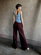 woman wearing SPRWMN premium knit cashmere brown pant elastic waistband  mid-rise wide leg