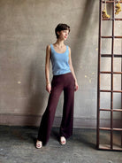 woman wearing SPRWMN premium knit cashmere brown pant elastic waistband  mid-rise wide leg