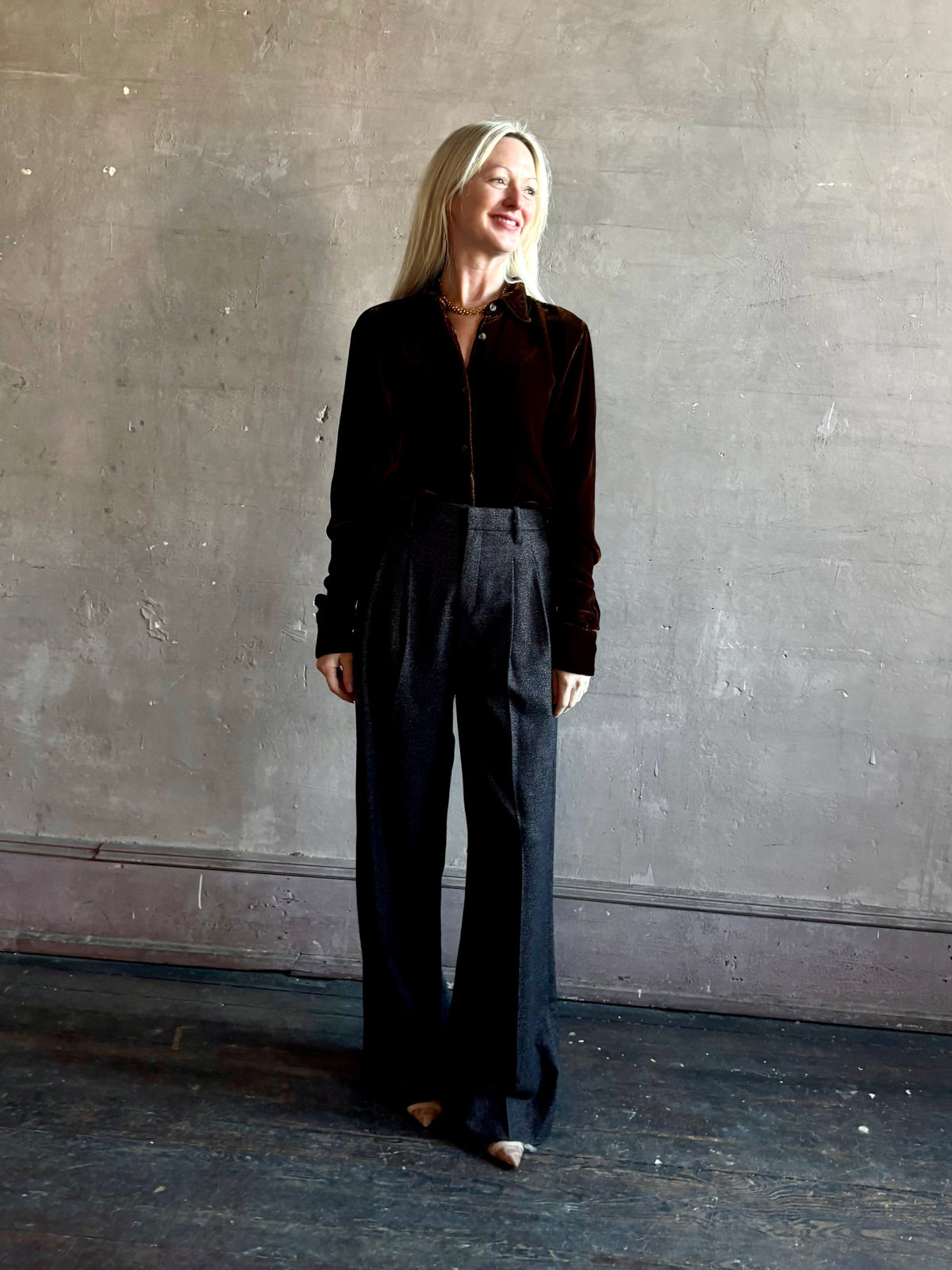 Mature woman wearing SPRWMN Elise Button Up Silk Velvet Top in Warm Brown classic collar long sleeve liquid drape Made in the USA quietly luxurious