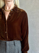 Mature woman wearing SPRWMN Elise Button Up Silk Velvet Top in Warm Brown classic collar long sleeve liquid drape Made in the USA quietly luxurious