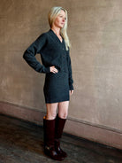 Image of woman wearing a luxury cashmere knitwear set from SPRWMN in charcoal grey