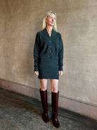 Image of mature woman wearing  SPRWMN Mia Skirt in charcoal grey luxury cashmere knitwear 