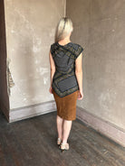 mature woman wearing contemporary designer SPRWMN brown suede leather pencil skirt medium brown