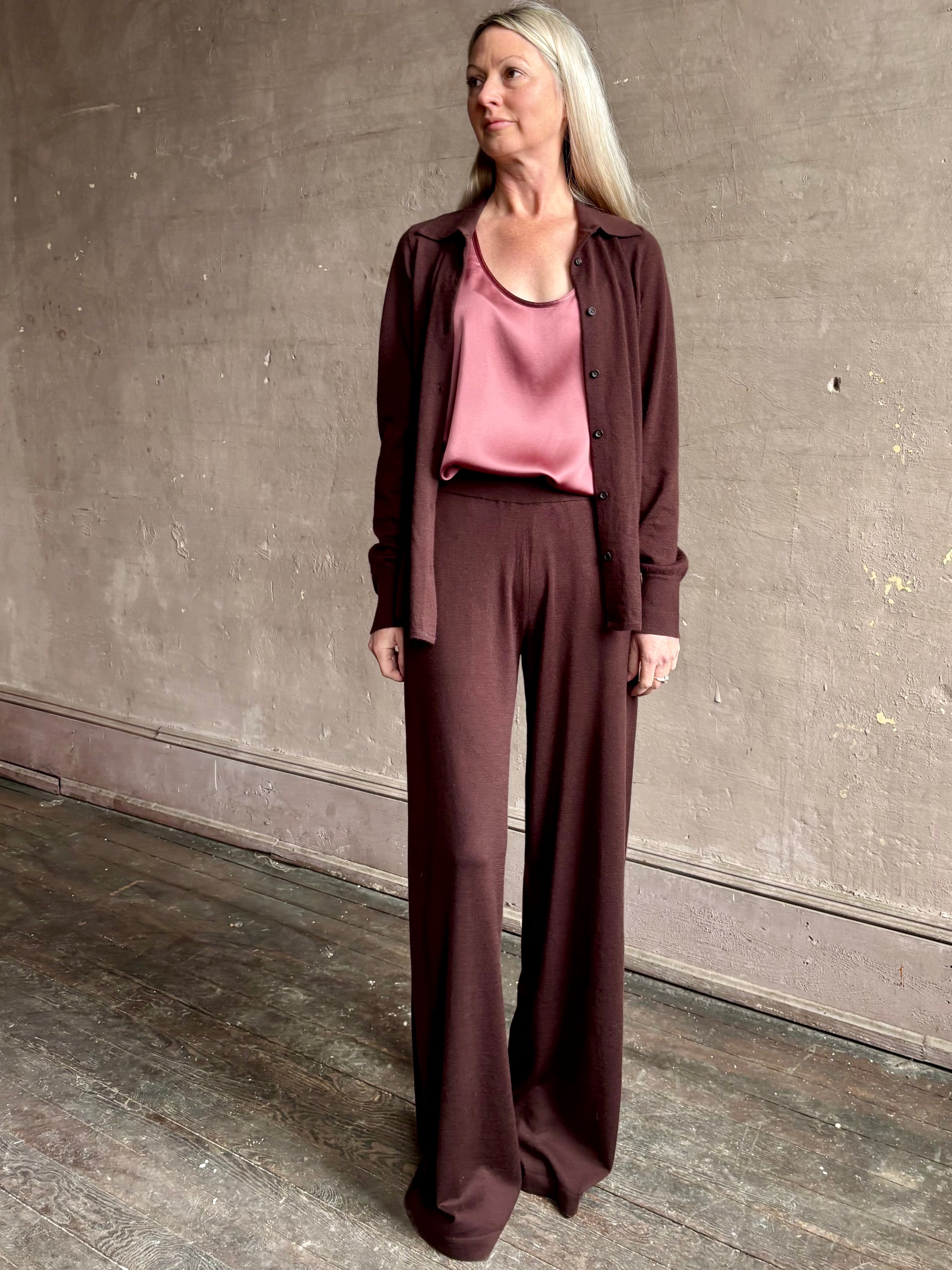 mature woman wearing SPRWMN premium knit cashmere brown pant elastic waistband  mid-rise wide leg