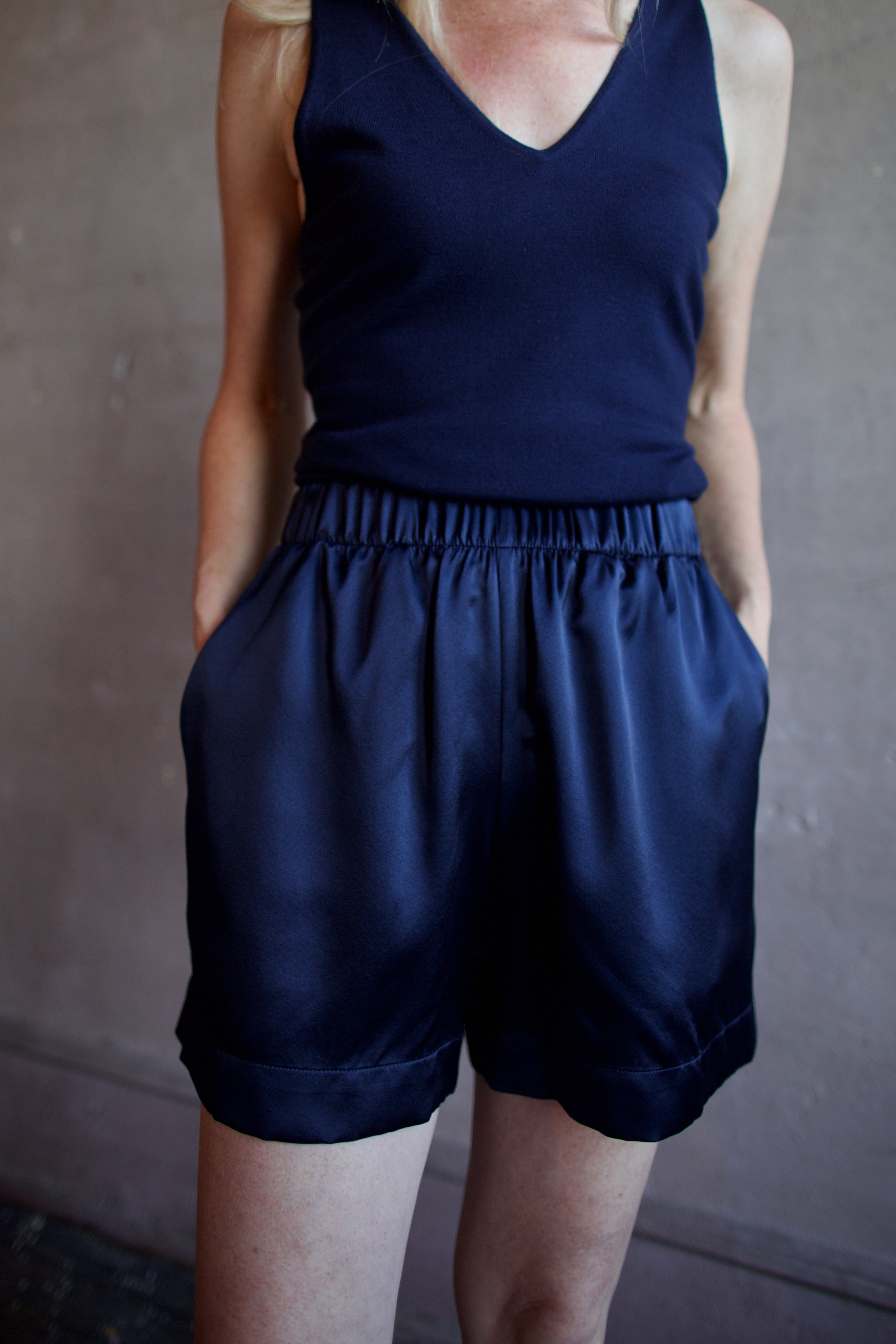 Image of a woman wearing the Sablyn Brynn Shorts and Addyson Layering Tank