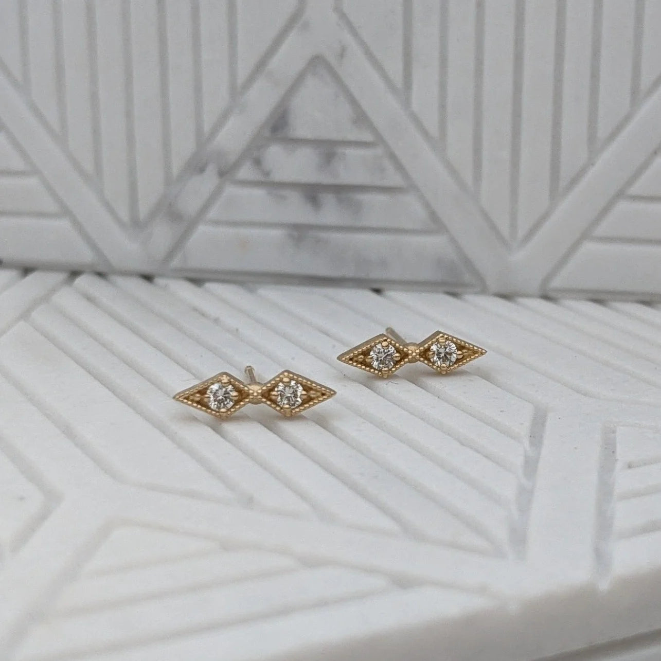Image of Asheville jeweler STEPHANIE ELLIS Diamond Double Star Stud Earrings in 14K Recycled Yellow Gold Fine Jewelry