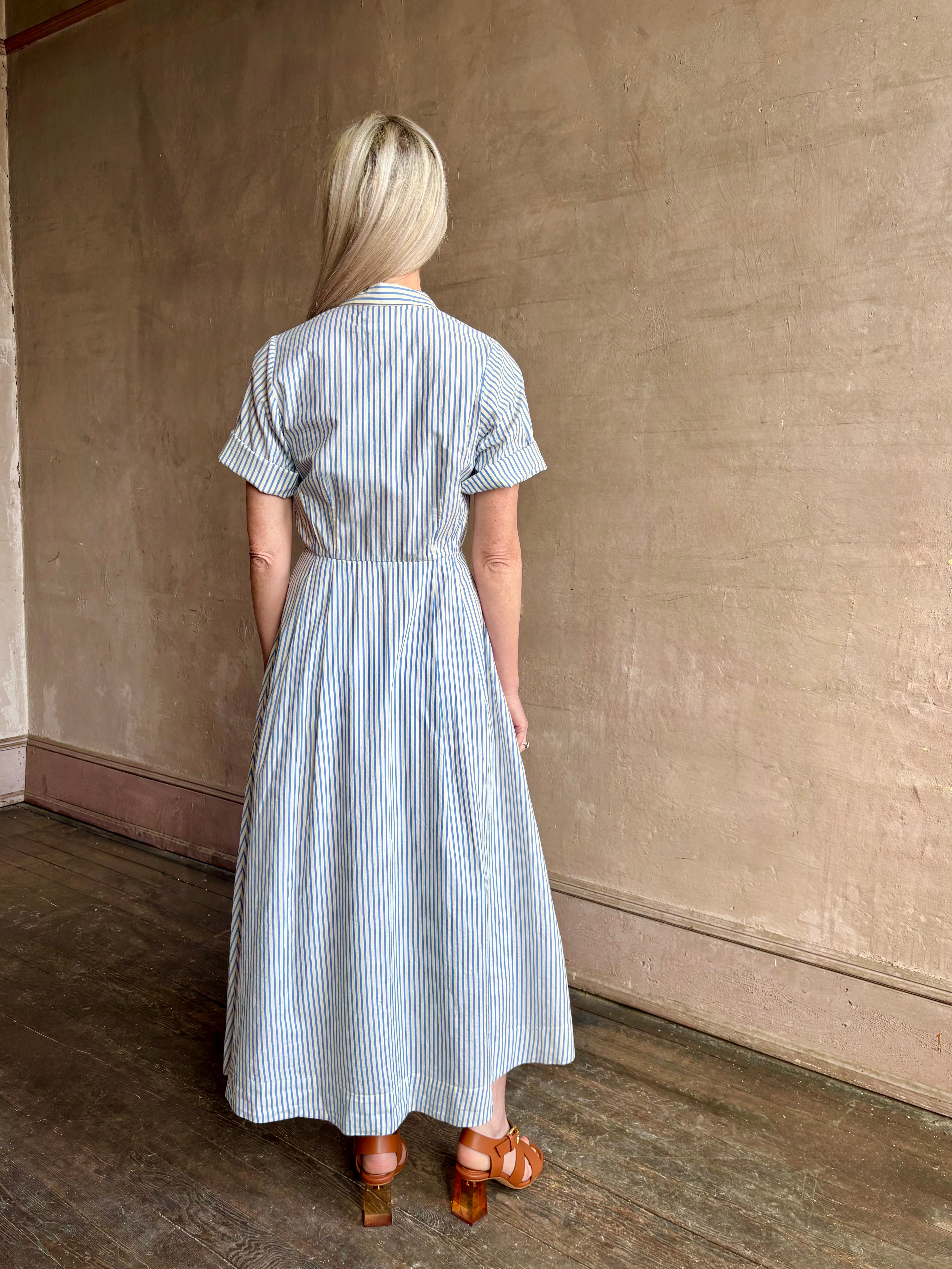 Image of woman wearing timeless TROVATA Aster A-line cotton shirt maxi Dress in Seaside blue and white Stripe expertly tailored