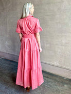 Image of woman wearing  TROVATA Martine button down cotton shirt dress in Rosdo rose with feminine ruffle sleeves and tiered skirt