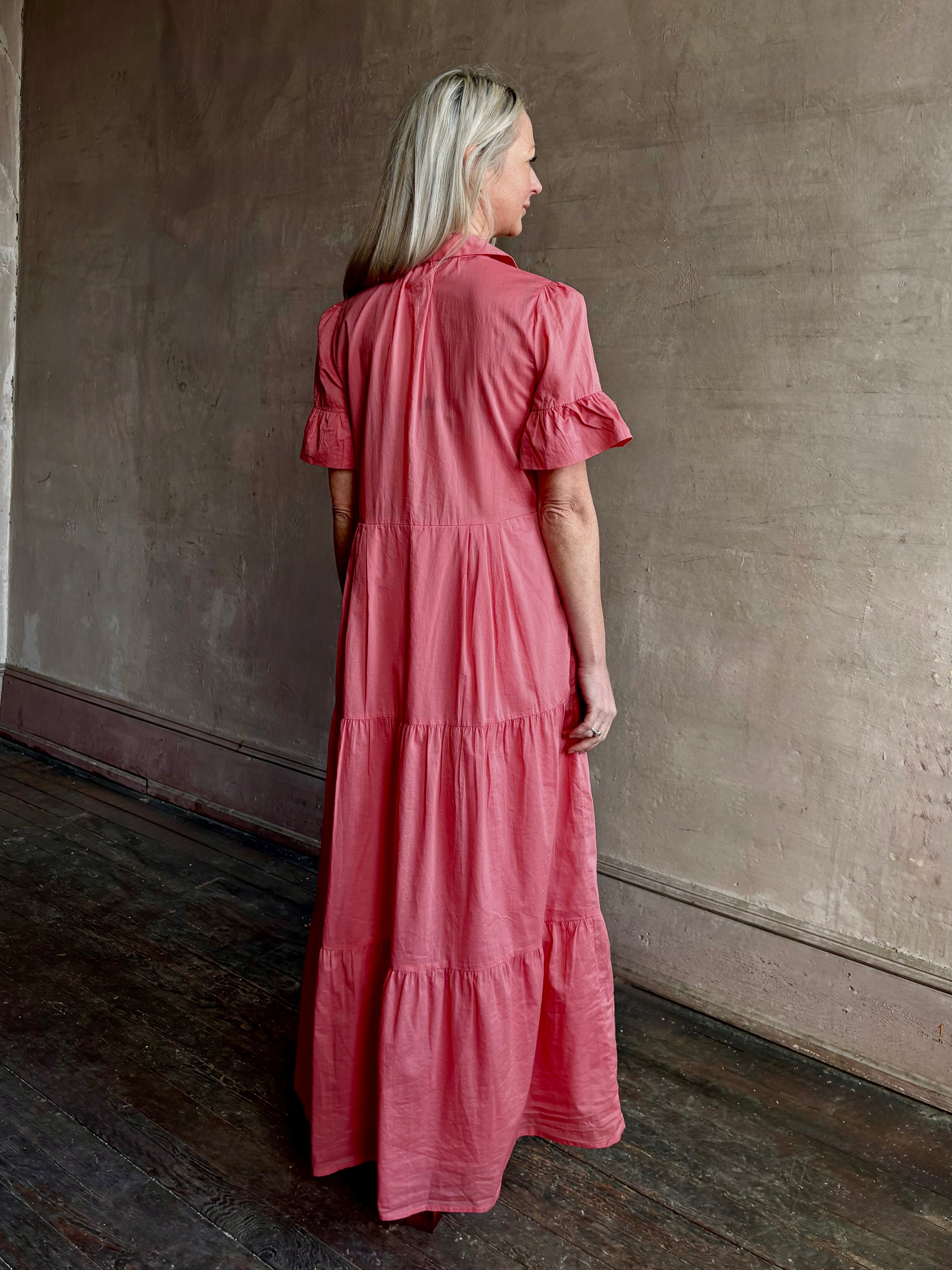 Image of woman wearing  TROVATA Martine button down cotton shirt dress in Rosdo rose with feminine ruffle sleeves and tiered skirt