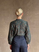 Trovata's Pauline Blouse in Marin Ditsy cotton poplin balloon sleeves. Romantic, movement-rich California charm