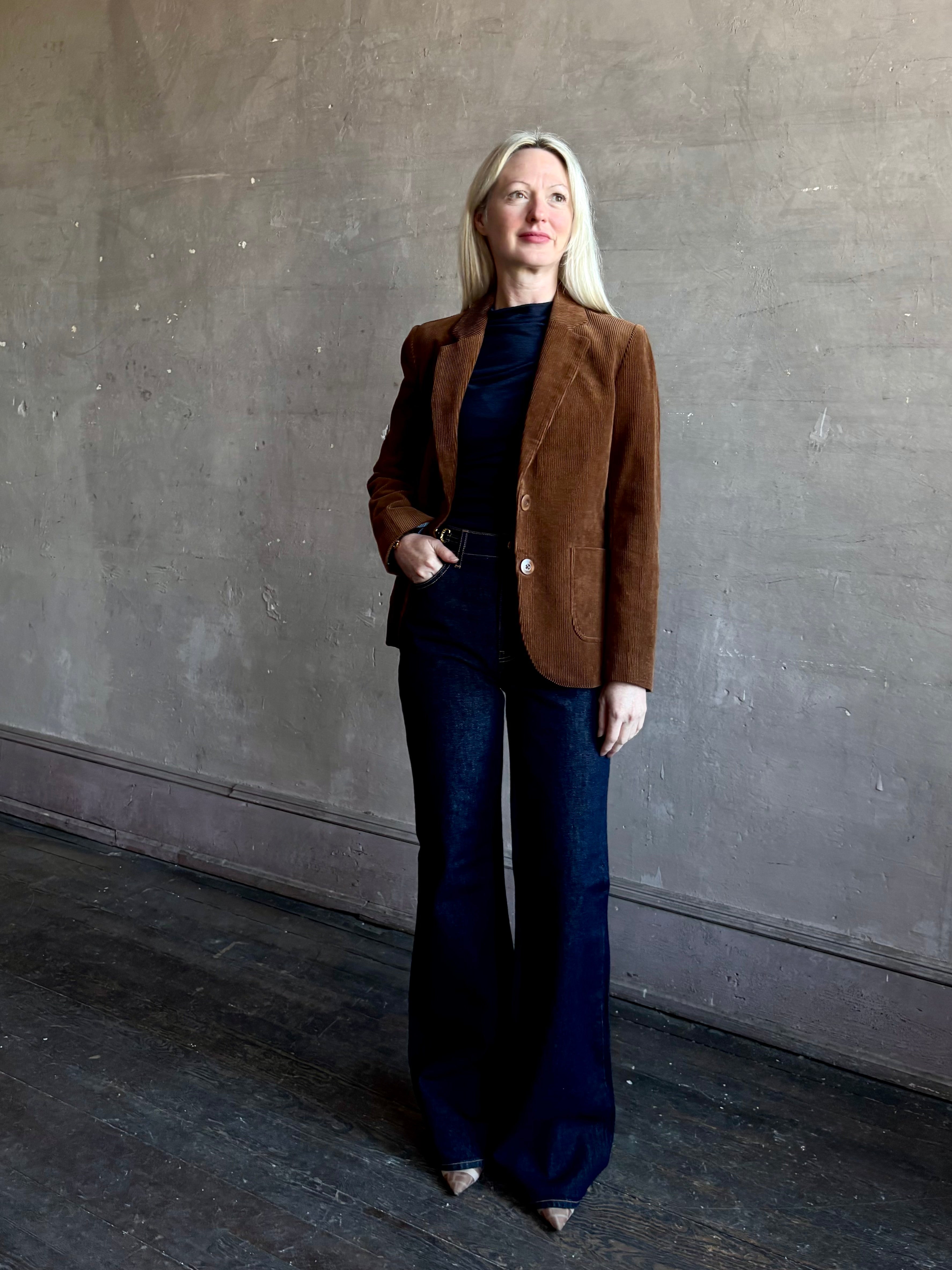 Mature woman wearing Trovata Skylar Cotton Corduroy Two Button Blazer in Walnut Brown front pockets heritage-inspired California tailoring